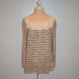 Free People New Romantics lace top features a scalloped hem and beaded detailing